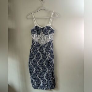 White/blue dress with pearl (s-m). I ripped it a bit, but fixable!